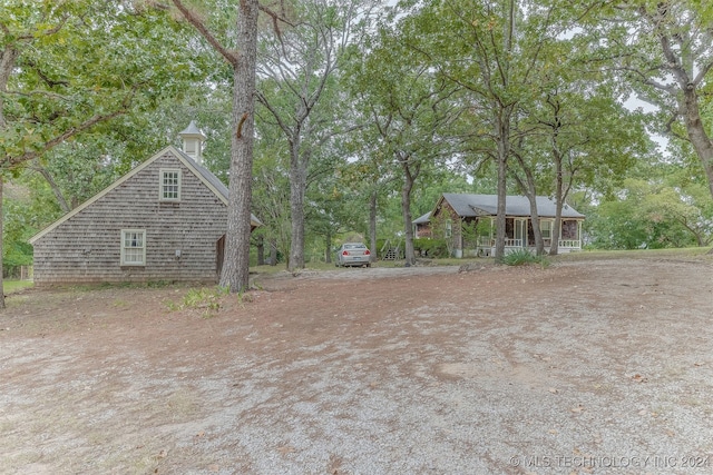 view of yard featuring a porch