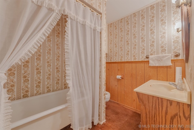 full bathroom with toilet, vanity, shower / tub combo with curtain, and wooden walls