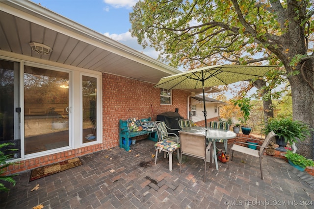 view of patio / terrace featuring a grill