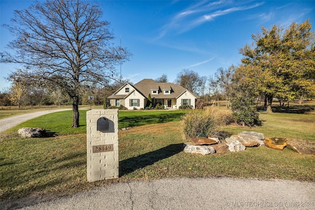 view of front of house with a front lawn