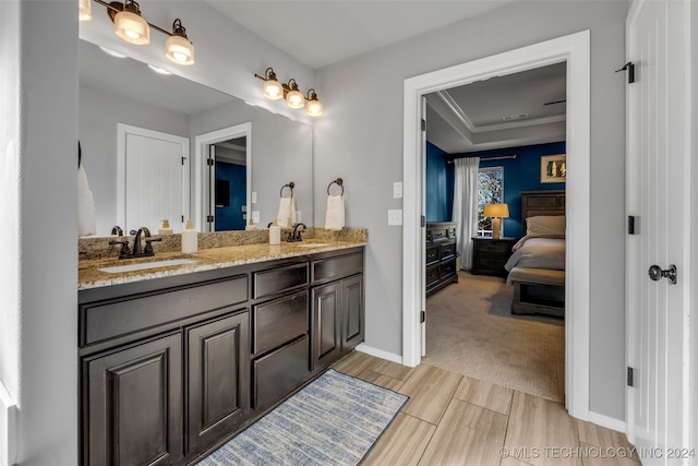 bathroom with vanity and ornamental molding