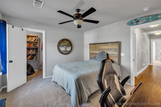 bedroom featuring baseboards, a ceiling fan, and carpet floors