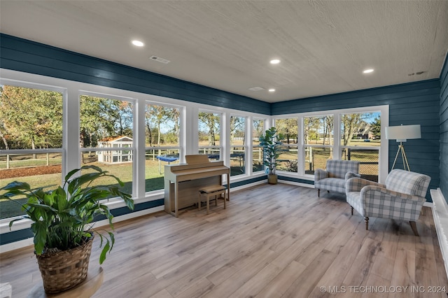 sunroom featuring plenty of natural light