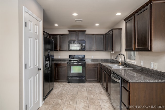 kitchen with dark brown cabinets, black appliances, and sink