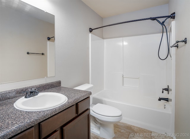 full bathroom with toilet, shower / bathing tub combination, vanity, and tile patterned flooring