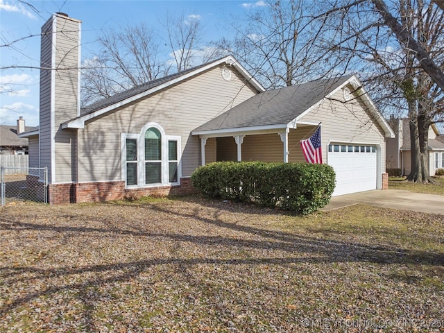 view of front of property featuring a garage