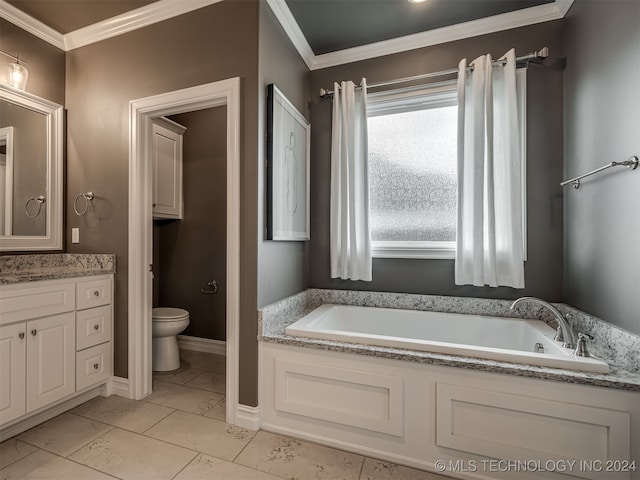 bathroom with a tub, vanity, toilet, and crown molding