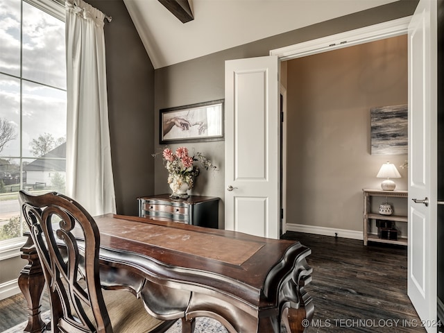 dining room featuring dark hardwood / wood-style floors and vaulted ceiling