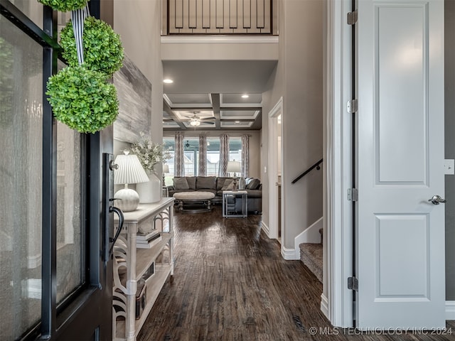 foyer entrance with hardwood / wood-style floors, ceiling fan, beam ceiling, and coffered ceiling