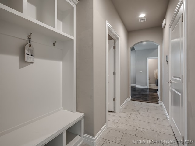 mudroom with light wood-type flooring