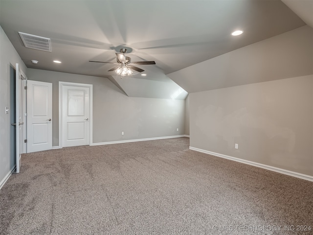 additional living space with lofted ceiling, ceiling fan, and carpet floors