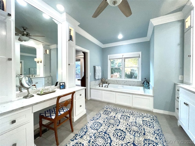 bathroom with tile patterned floors, a tub to relax in, ceiling fan, and ornamental molding