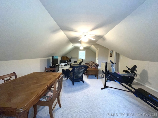 office with ceiling fan, carpet flooring, and vaulted ceiling