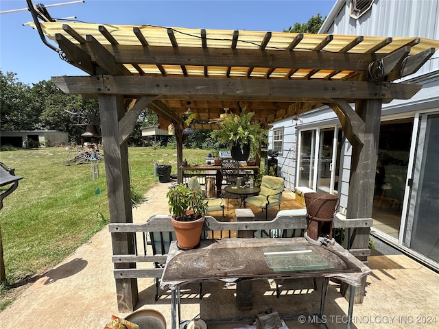 view of patio featuring a pergola