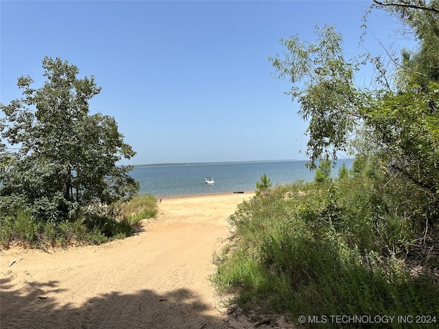 property view of water featuring a view of the beach