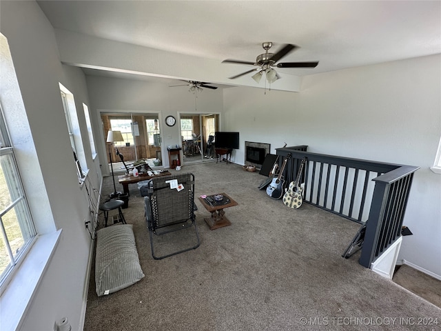 living room with carpet floors and ceiling fan