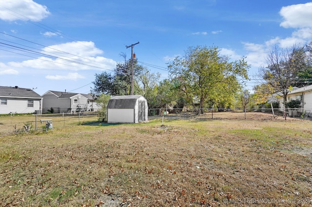 view of yard with a storage shed