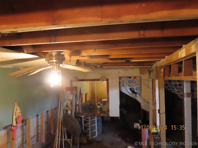 basement with ceiling fan