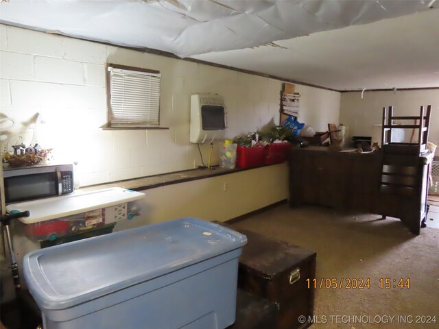 basement featuring heating unit