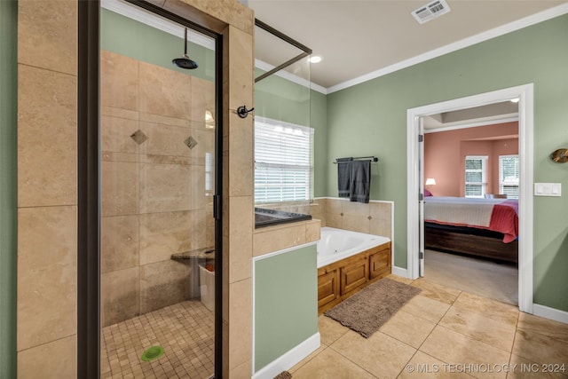 ensuite bathroom featuring a stall shower, a garden tub, visible vents, and crown molding