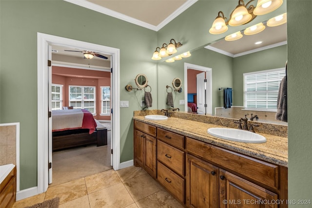 bathroom featuring crown molding, ceiling fan, tile patterned floors, and vanity