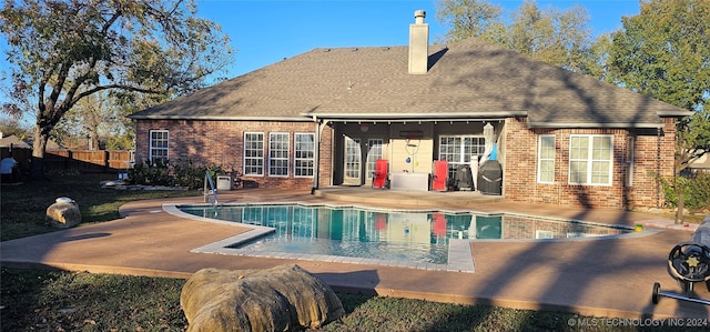 view of pool with a patio, fence, and a fenced in pool