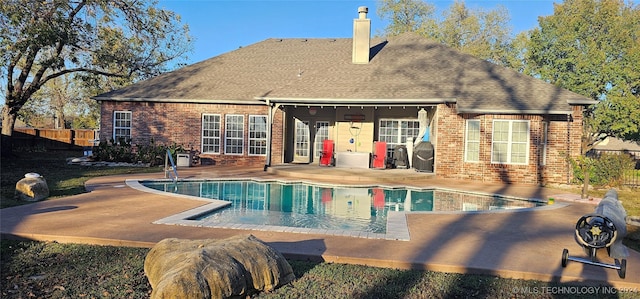 view of pool featuring a fenced in pool, a patio, and fence