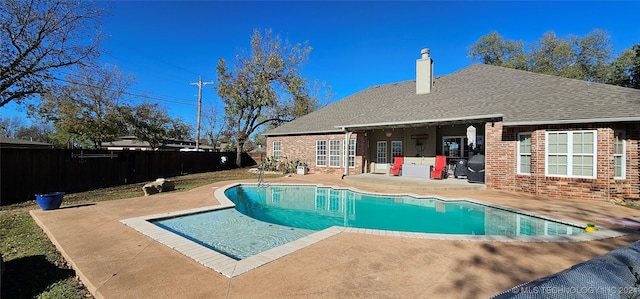 view of pool with a patio area