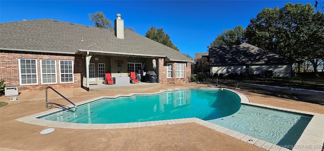 view of pool with a patio