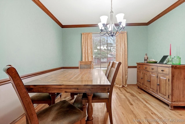 dining room featuring an inviting chandelier, crown molding, and light wood-type flooring