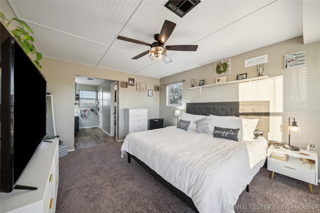 carpeted bedroom featuring ceiling fan