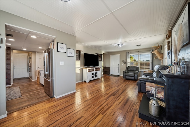 living room with hardwood / wood-style flooring