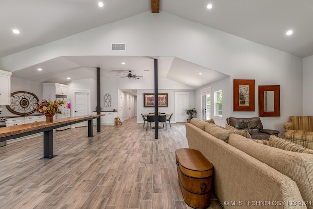 playroom featuring high vaulted ceiling, light hardwood / wood-style floors, ceiling fan, and beam ceiling