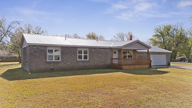 ranch-style house with a front lawn and a garage