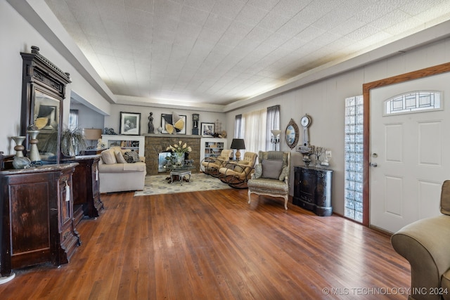 living room with dark hardwood / wood-style floors