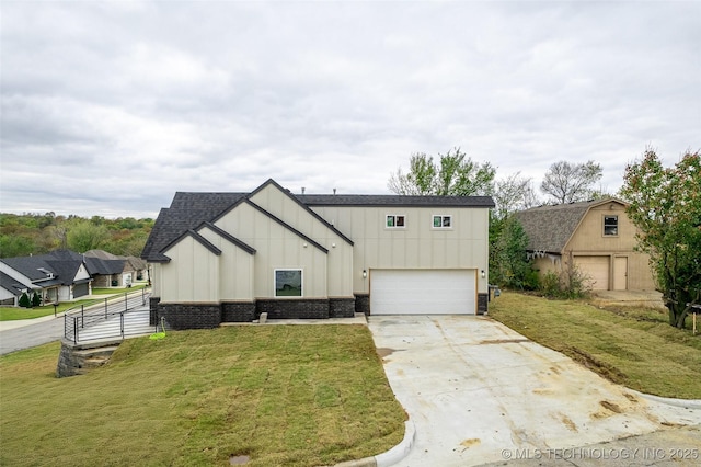 modern farmhouse style home featuring a front lawn and a garage