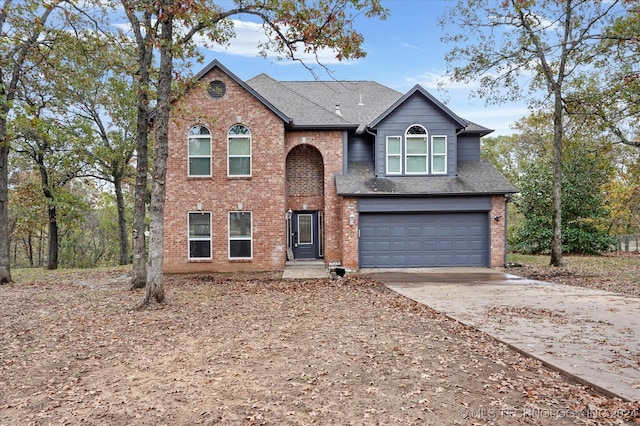 view of front of property featuring a garage