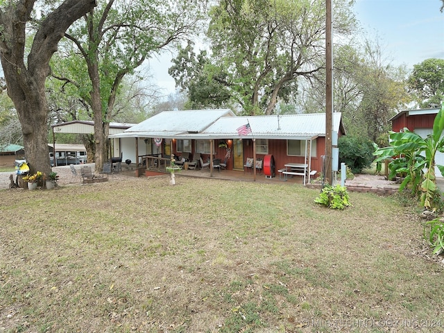 exterior space featuring a front yard