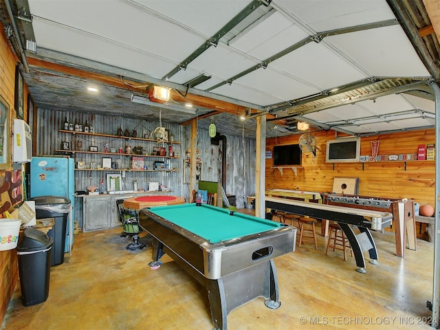 recreation room featuring billiards and wooden walls