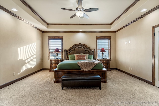 bedroom with light colored carpet, ceiling fan, and crown molding