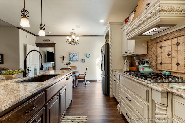 kitchen featuring stainless steel appliances, sink, custom range hood, backsplash, and dark wood-type flooring