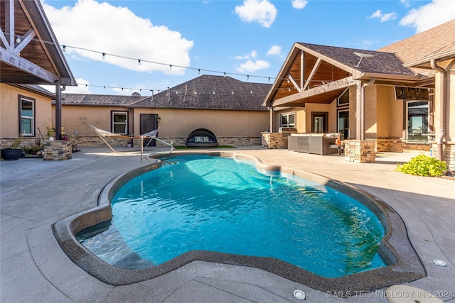 view of pool with a patio area