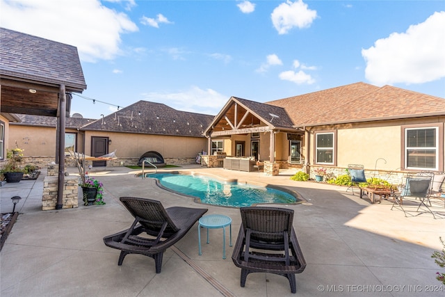 view of pool with a patio area