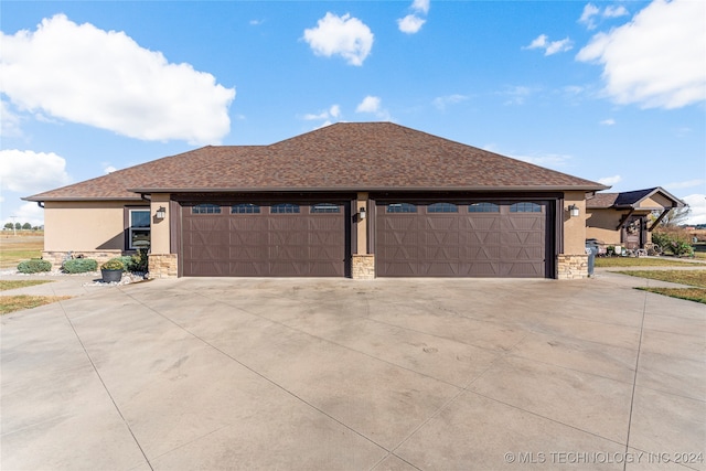 prairie-style house with a garage