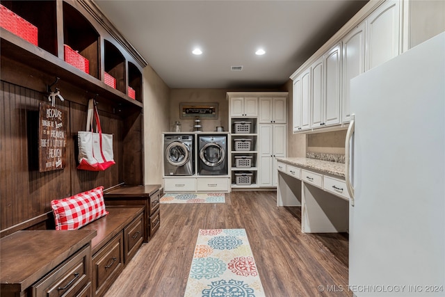 mudroom featuring separate washer and dryer and dark hardwood / wood-style flooring