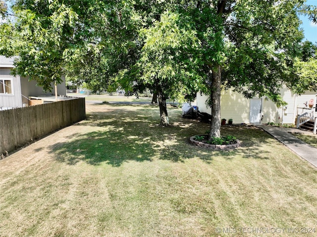 view of yard featuring a deck