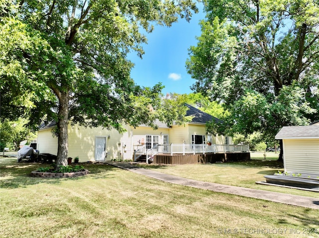 view of yard featuring a deck