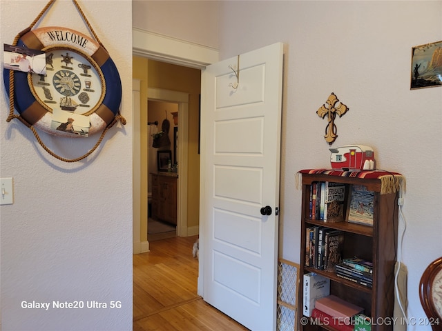 hallway featuring hardwood / wood-style floors