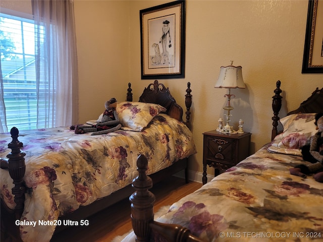 bedroom featuring hardwood / wood-style flooring