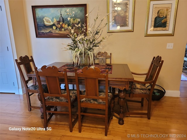 dining room featuring hardwood / wood-style flooring